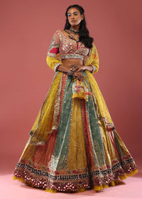 Multi Coloured Brocade Lehenga With Bandhani Print And Heavy Mirror Work On The Border