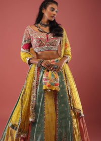 Multi Coloured Brocade Lehenga With Bandhani Print And Heavy Mirror Work On The Border