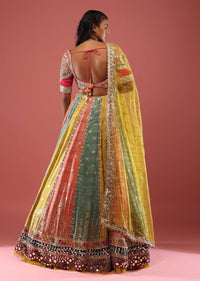 Multi Coloured Brocade Lehenga With Bandhani Print And Heavy Mirror Work On The Border