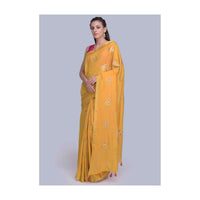 Mustard dola silk saree with weaved butti and tasseled pallo only on Kalki