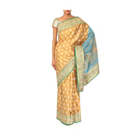 Mustard saree featuring in weaved butti and gotta border only on Kalki