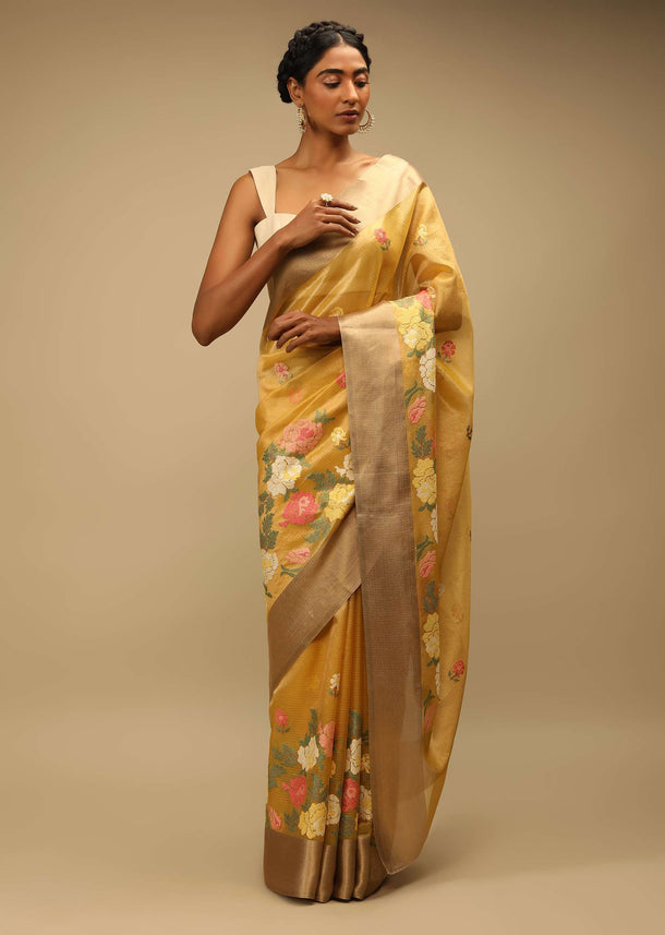 Mustard Saree In Zari Kota Silk With Multi Colored Resham Embroidered Flowers On The Border