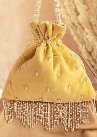 Mustard Yellow Hand Embroidered Potli In Raw Silk
