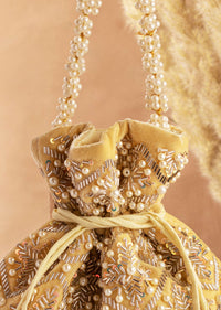 Mustard Yellow Hand Embroidered Potli In Raw Silk