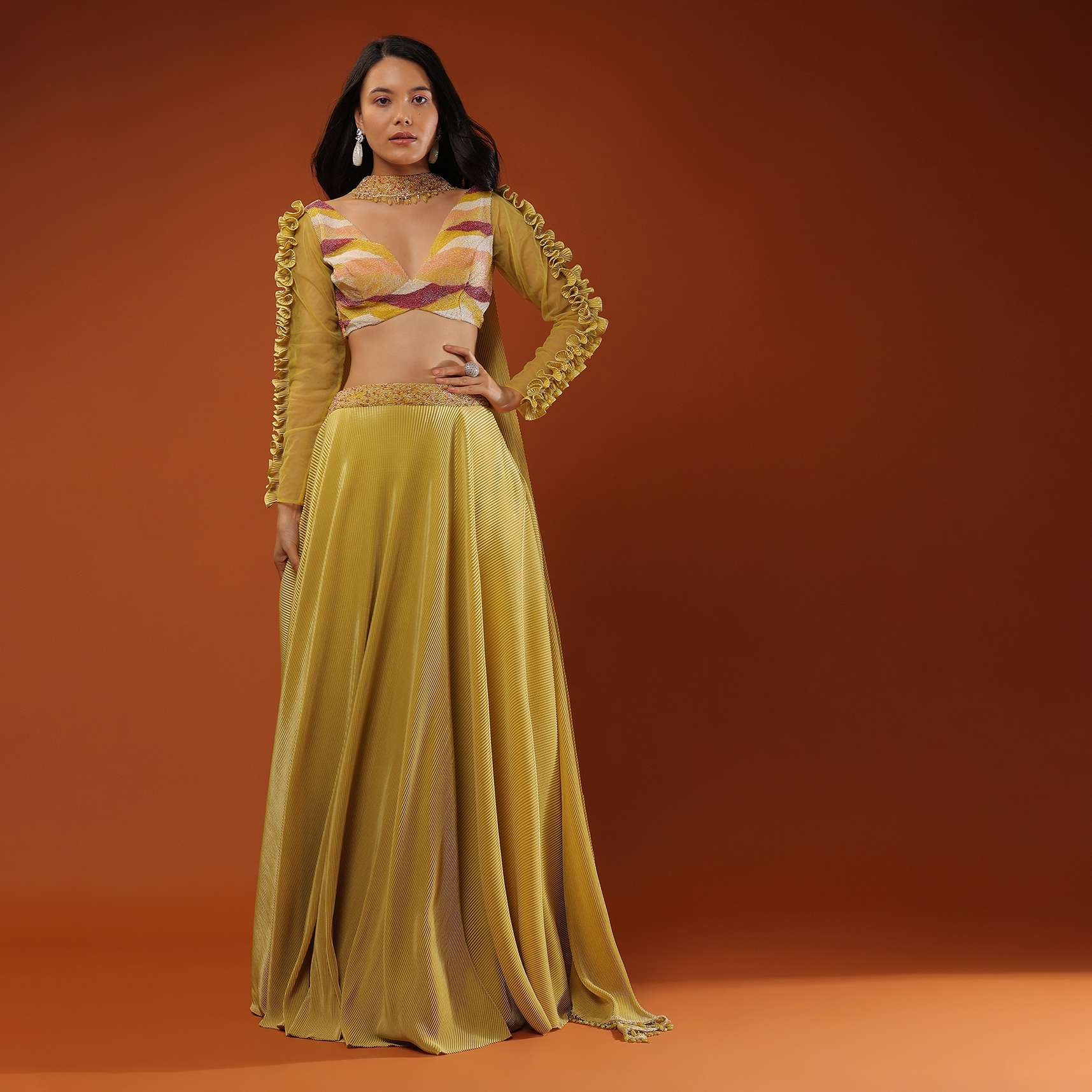 Mustard Yellow Lehenga And A Crop Top With Frills On The Top Of The Sleeves, Crafted In Crepe With Moti Embroidery