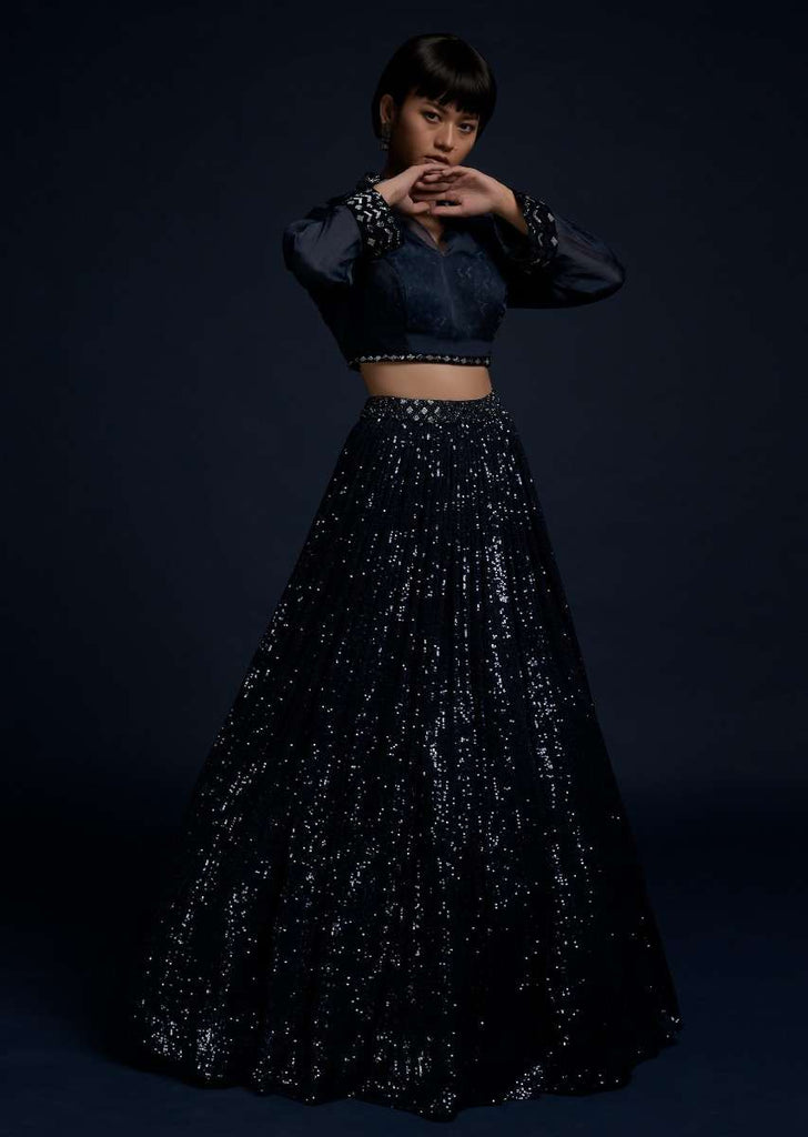 Navy Blue Lehenga Embellished In Sequins With A Matching Organza Crop Top Adorned With Cut Dana On The Underlayer