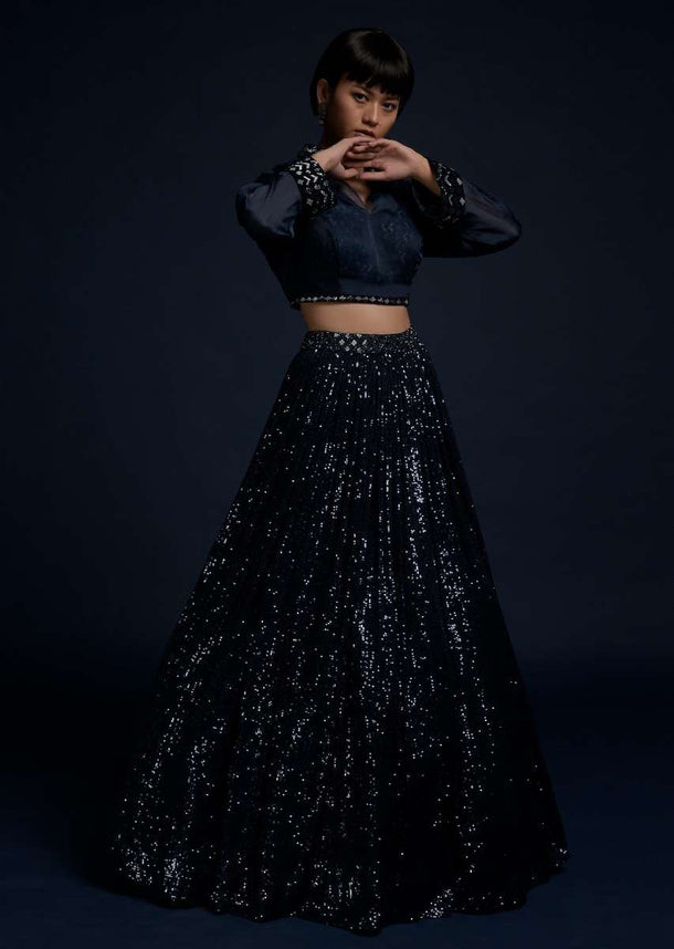 Navy Blue Lehenga Embellished In Sequins With A Matching Organza Crop Top Adorned With Cut Dana On The Underlayer