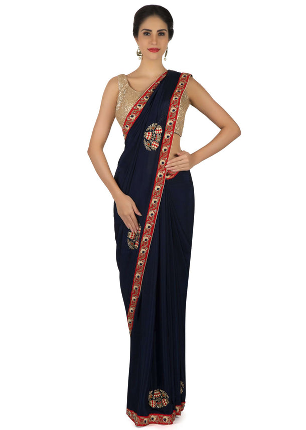 Navy blue saree in satin chiffon in resham and thread embroidered butti only on Kalki