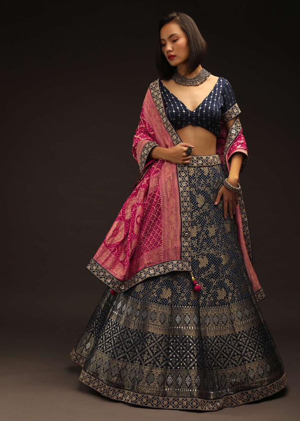 Navy Blue Lehenga Choli With Woven Bandhani And Brocade Jaal Along With A Shaded Bandhani Dupatta