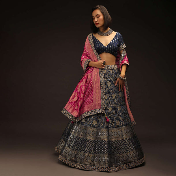 Navy Blue Lehenga Choli With Woven Bandhani And Brocade Jaal Along With A Shaded Bandhani Dupatta