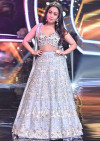 Neha Kakkar in Kalki raw silk lehenga set with greek inspired velvet trail attached to the blouse