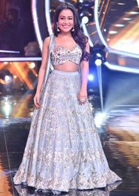 Neha Kakkar in Kalki raw silk lehenga set with greek inspired velvet trail attached to the blouse