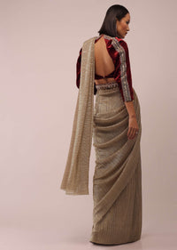 Nomad Shimmer Crush Ready Pleated Saree With A Velvet Crop Top In Cut Dana Embroidery, Crop Top Comes In 3/4Th Sleeves In A Plunging Neckline