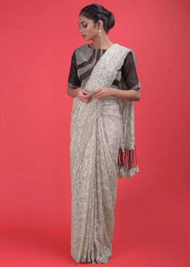 Nude Beige Saree In Floral Lace With Sequins And A Dark Purple Blouse  Online - Kalki Fashion