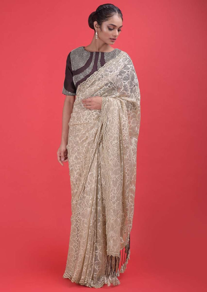 Nude Beige Saree In Floral Lace With Sequins And A Dark Purple Blouse  Online - Kalki Fashion