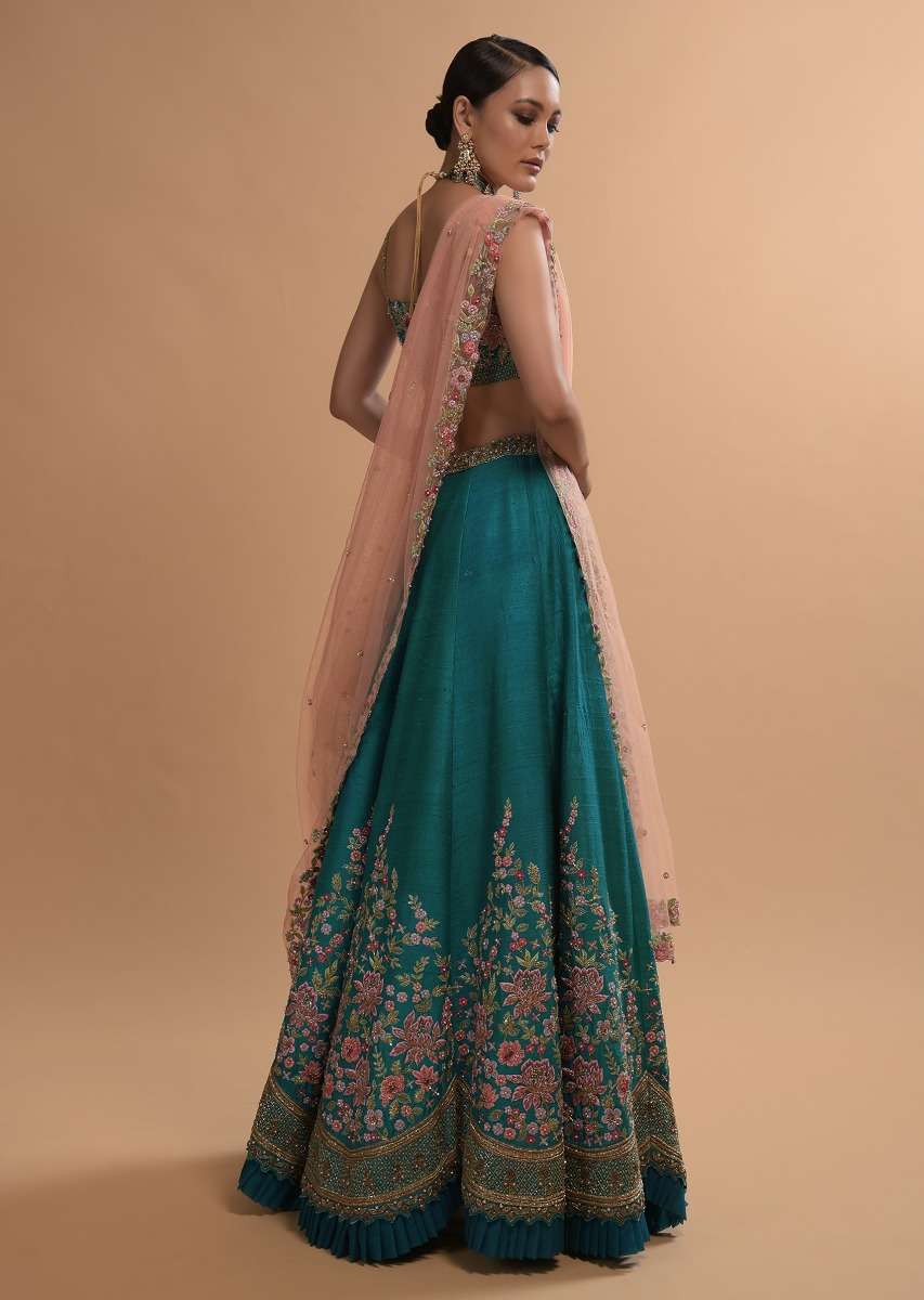 Ocean Green Lehenga Choli In Raw Silk With Resham Embroidered Spring Blooms And Scallop Hem