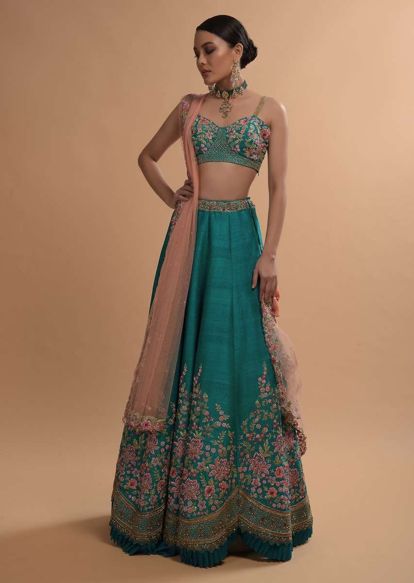 Ocean Green Lehenga Choli In Raw Silk With Resham Embroidered Spring Blooms And Scallop Hem