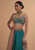 Ocean Green Lehenga Choli In Raw Silk With Resham Embroidered Spring Blooms And Scallop Hem