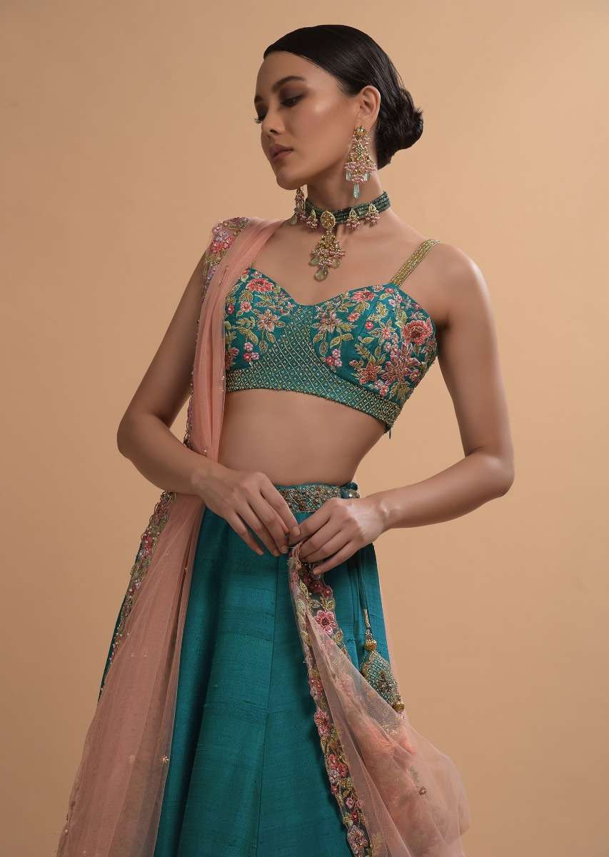 Ocean Green Lehenga Choli In Raw Silk With Resham Embroidered Spring Blooms And Scallop Hem