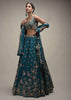 Ocean Green Lehenga Choli In Raw Silk With Colorful Resham Embroidered Spring Blossoms