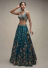 Ocean Green Lehenga Choli In Raw Silk With Colorful Resham Embroidered Spring Blossoms