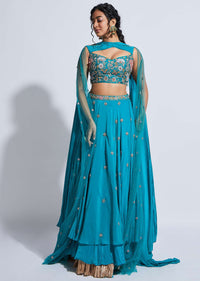 Ocean Green Skirt And Crop Top With An Attached Criss Cross Drape On The Neckline Shoulders Online - Kalki Fashion