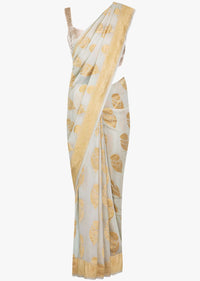 Off white georgette saree in weaved floral butti all over only on Kalki