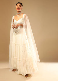 Off White Gown In Georgette With Tiered Flare And Hand Embroidered Leaf Motifs On The Bodice