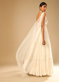 Off White Gown In Georgette With Tiered Flare And Hand Embroidered Leaf Motifs On The Bodice