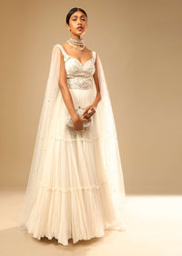 Off White Gown In Georgette With Tiered Flare And Hand Embroidered Leaf Motifs On The Bodice