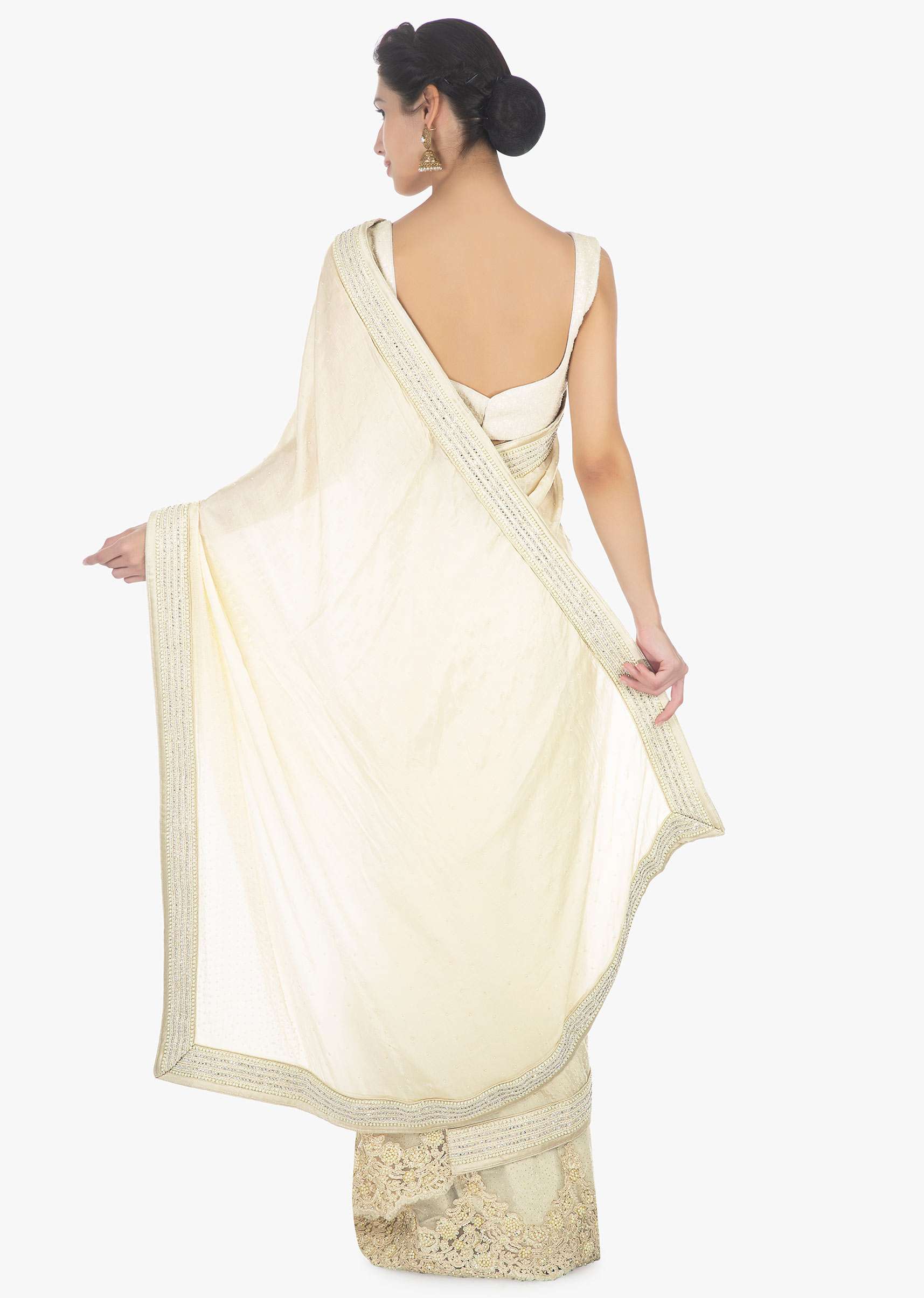 Off white half and half saree in chiffon and net saree with embellished scallop border 