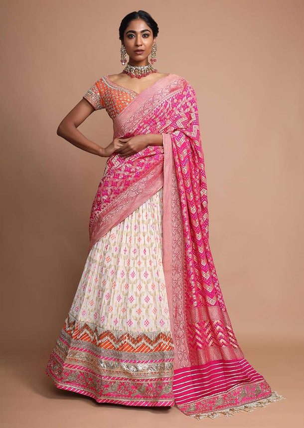 Off White Lehenga With Bandhani Print, Weaved Design And Heavy Gotta Work Border