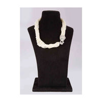 Off white multi string beaded necklace with animal motif pendant along with a matching tasseled earrings only on Kalki