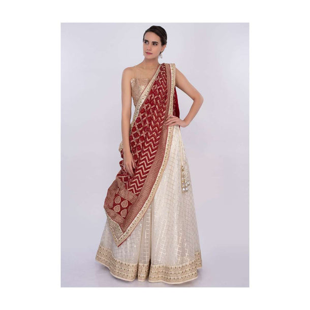 Off white organza lehenga set with red bandhani dupatta only on Kalki