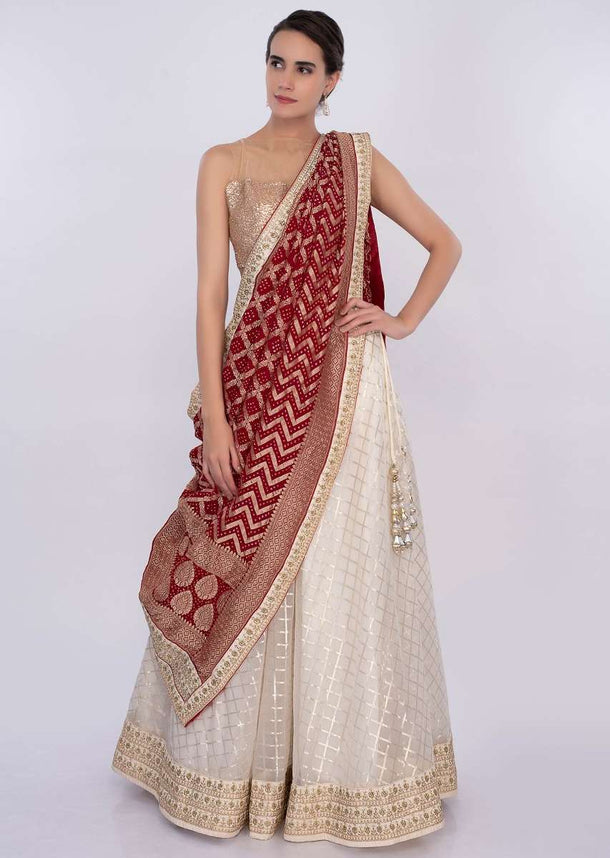 Off white organza lehenga set with red bandhani dupatta only on Kalki