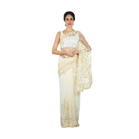 Off white saree in net with self color sequin and cut dana embroidery only on Kalki