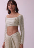 Off-White Sequins Saree And Blouse With Cowl Sleeves And Tassels