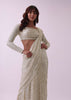 Off-White Sequins Saree And Blouse With Cowl Sleeves And Tassels