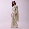 Off-White Sequins Saree And Blouse With Cowl Sleeves And Tassels