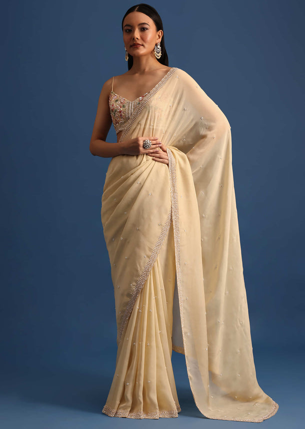 Off White Cutdana Embroidered Crepe Saree With Unstitched Blouse