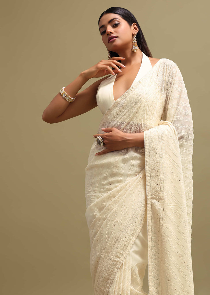 Off White Georgette Saree In Chikankari Work With Unstitched Blouse