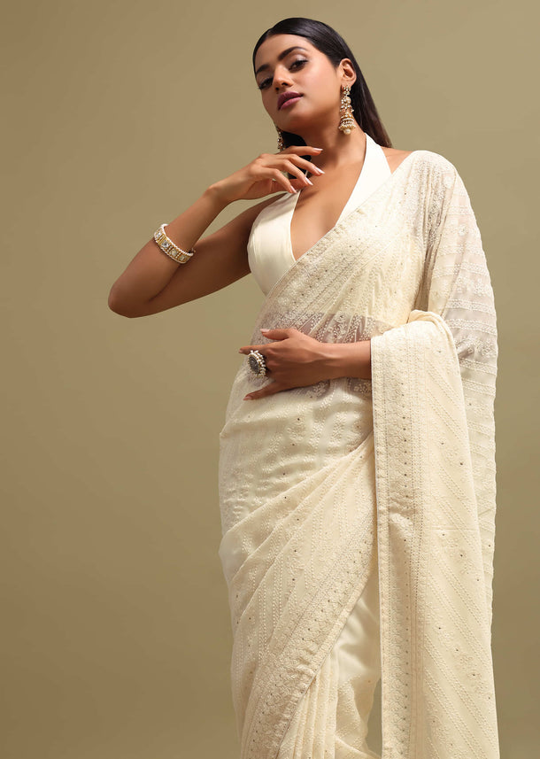 Off White Georgette Saree In Chikankari Work With Unstitched Blouse