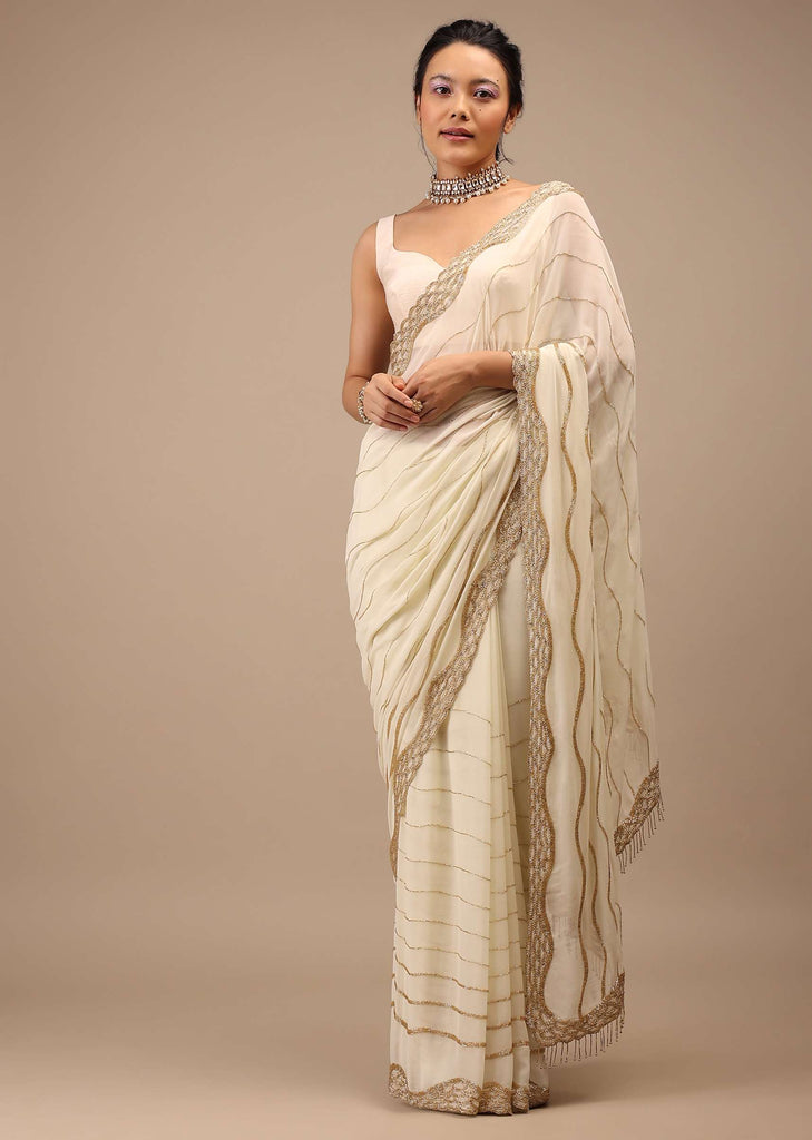 Off White Georgette Saree With Cut Dana Zardosi Embroidery Along With Copper Detailing