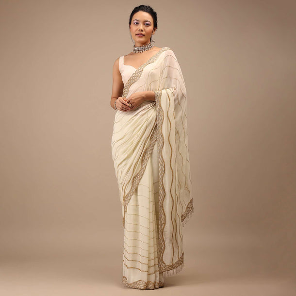 Off White Georgette Saree With Cut Dana Zardosi Embroidery Along With Copper Detailing