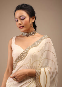 Off White Georgette Saree With Cut Dana Zardosi Embroidery Along With Copper Detailing