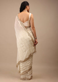 Off White Georgette Saree With Cut Dana Zardosi Embroidery Along With Copper Detailing