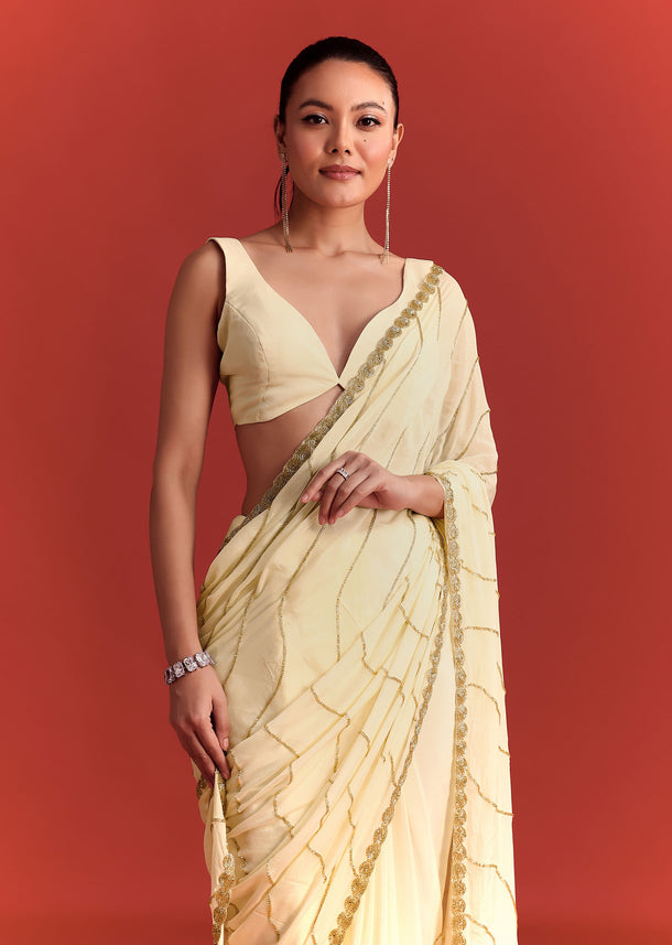 Off White Saree In Chinnon With Cutdana Embroidery