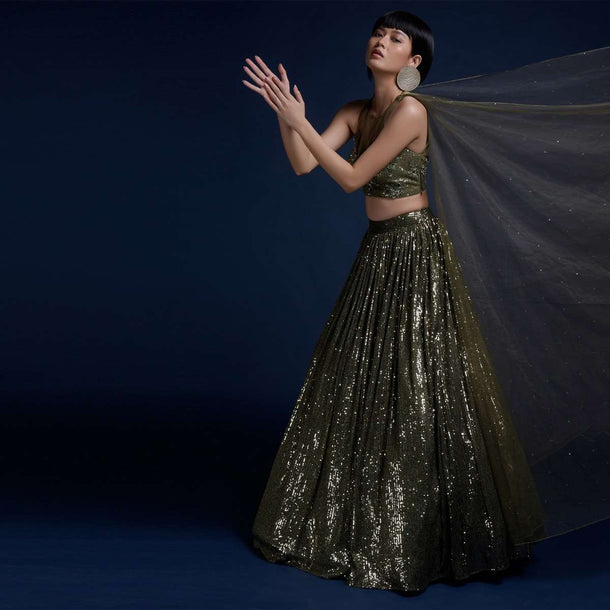 Olive Green Lehenga Embellished In Sequins And Cut Dana Embellished Crop Top With Attached Net Cape