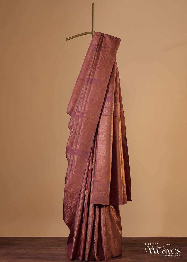 Onion Pink Woven Kanjivaram Silk Saree With An Unstitched Blouse