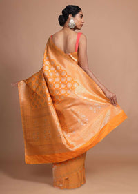 Orange art handloom Saree In Silk With Weaved Floral Buttis